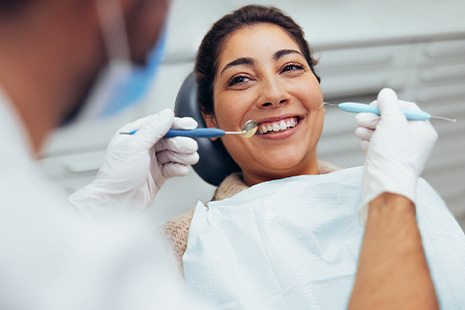 Dental implants can save you money because you won’t need to replace them every five to ten years like you do with dentures or dental bridges