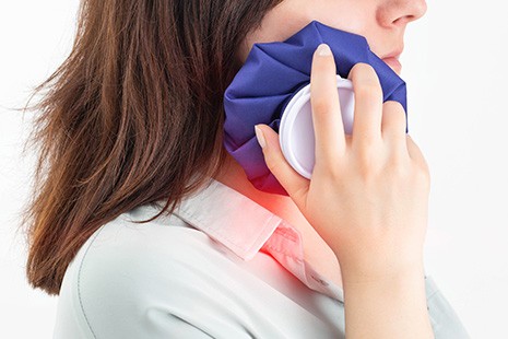 Some soreness and discomfort is normal after dental implant surgery